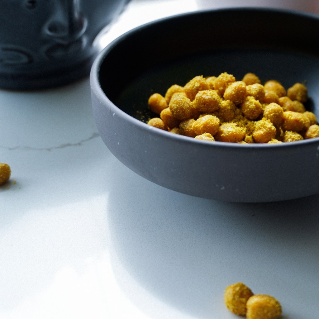 bowl of the best cheesy vegan roasted chickpeas